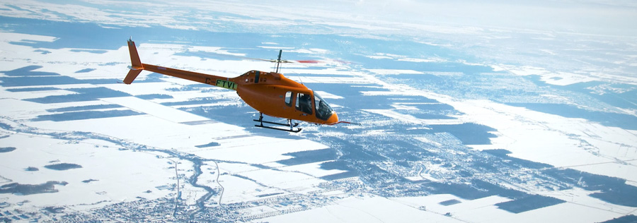 bell 505 jet ranger x flying durring winter